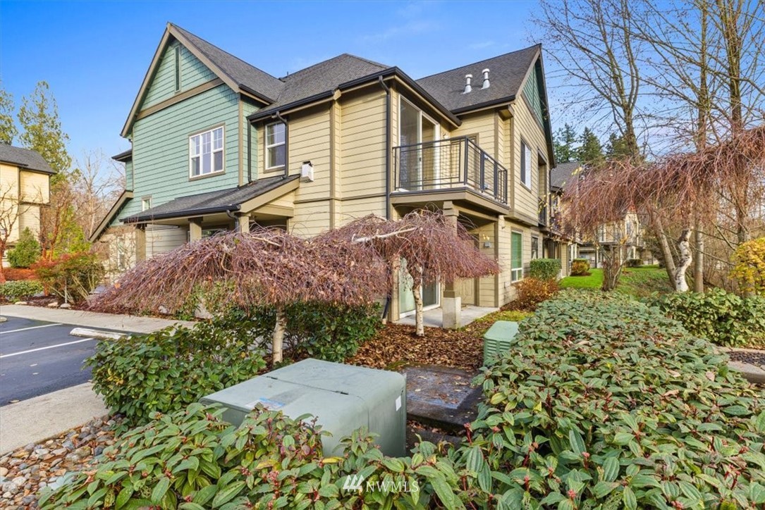 19102 20th Drive Southeast, Unit B206 Bothell, WA 98012 - Photo 29 of 29 front view of a house with a yard