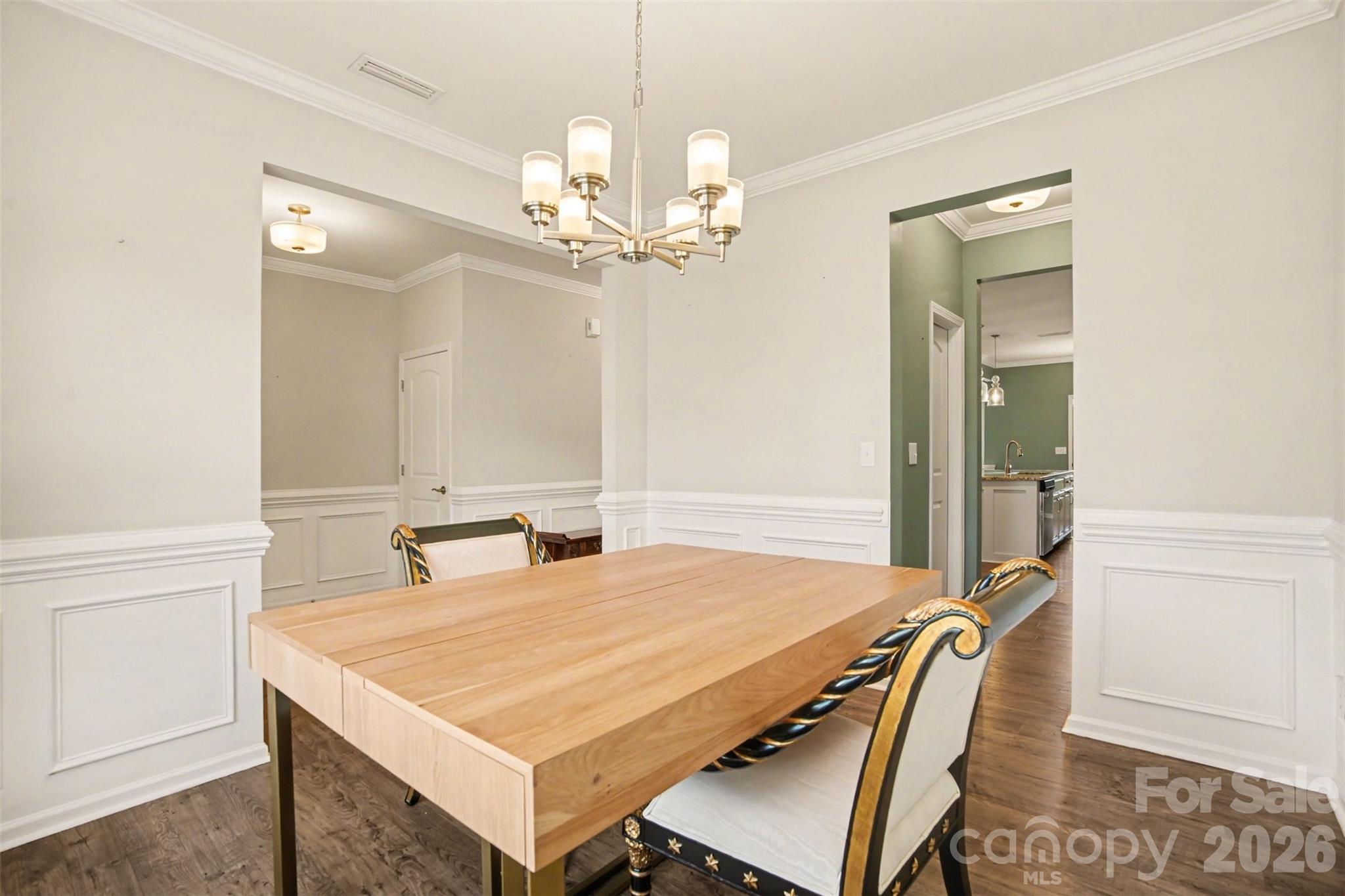 2013 Fuschia Court Tega Cay, SC 29708 - Photo 14 of 47 a room with a table chairs and chandelier
