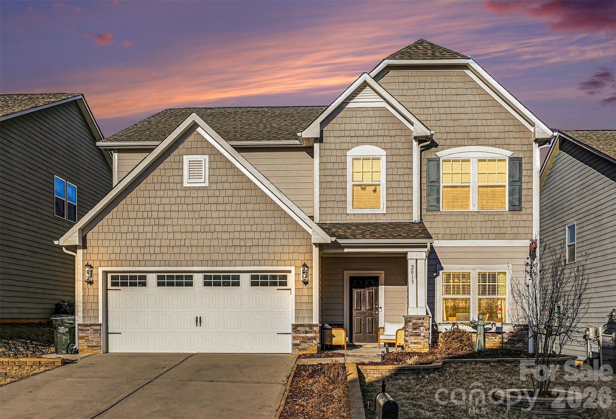 2013 Fuschia Court Tega Cay, SC 29708 - Photo 2 of 47 a view of a house with wooden fence