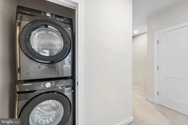 a close up view of a washer and dryer in a utility room