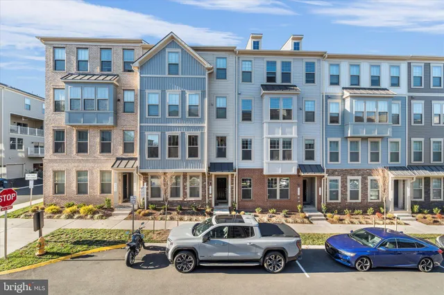 a car parked in front of a brick building