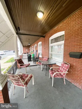 a outdoor space with lots of furniture and a couch