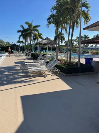 a view of outdoor space with swimming pool