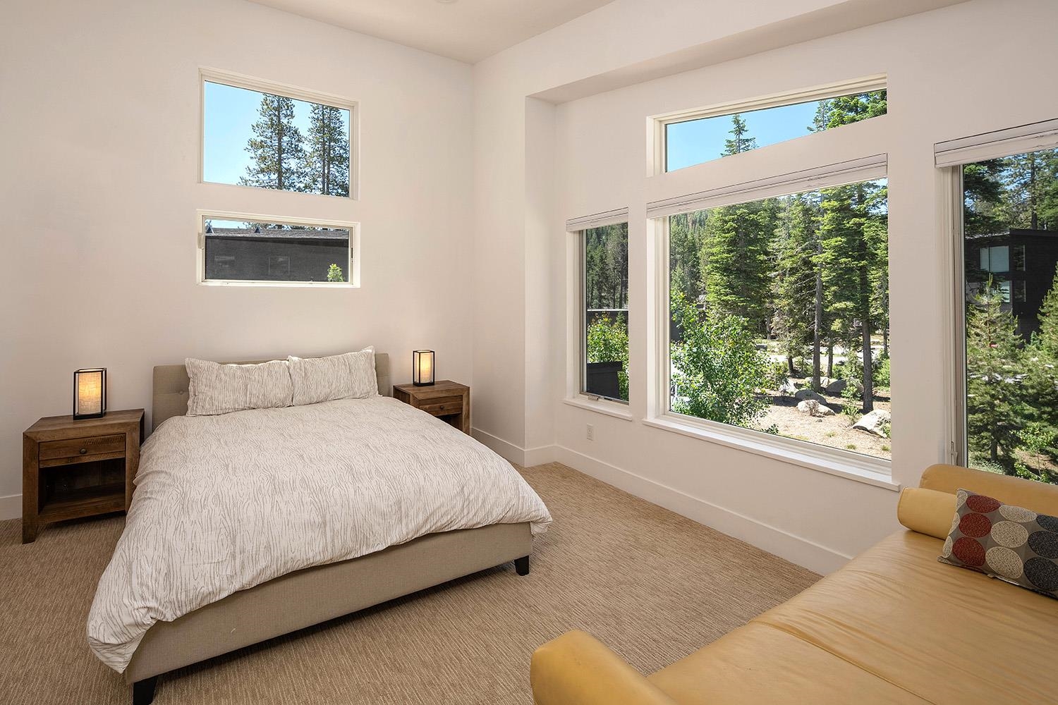 120 Smiley Circle Olympic Valley, CA 96146 - Photo 13 of 21 a bedroom with a bed and a large window
