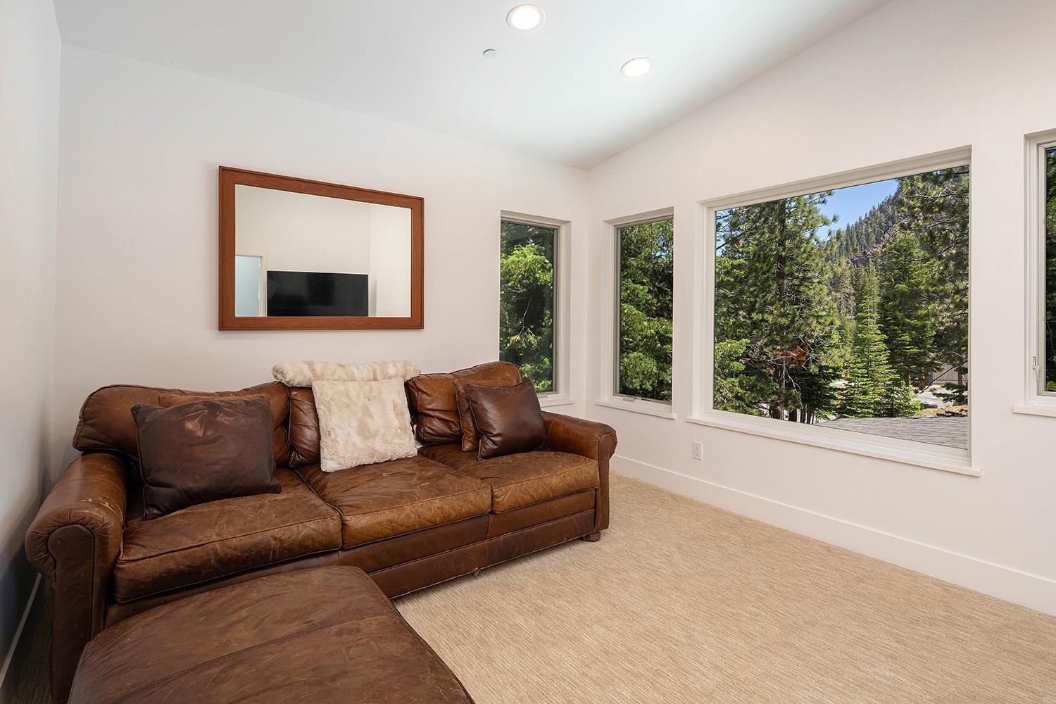 120 Smiley Circle Olympic Valley, CA 96146 - Photo 16 of 21 a living room with furniture and a large window