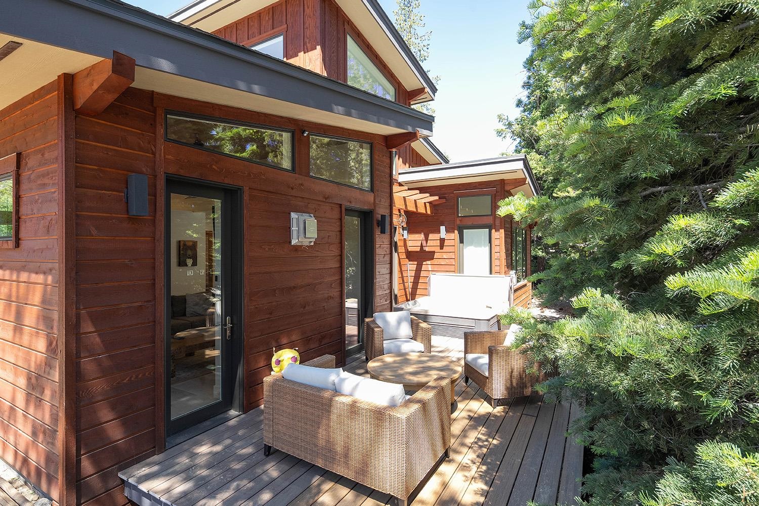 120 Smiley Circle Olympic Valley, CA 96146 - Photo 21 of 21 a view of a building with a couches and table and chairs