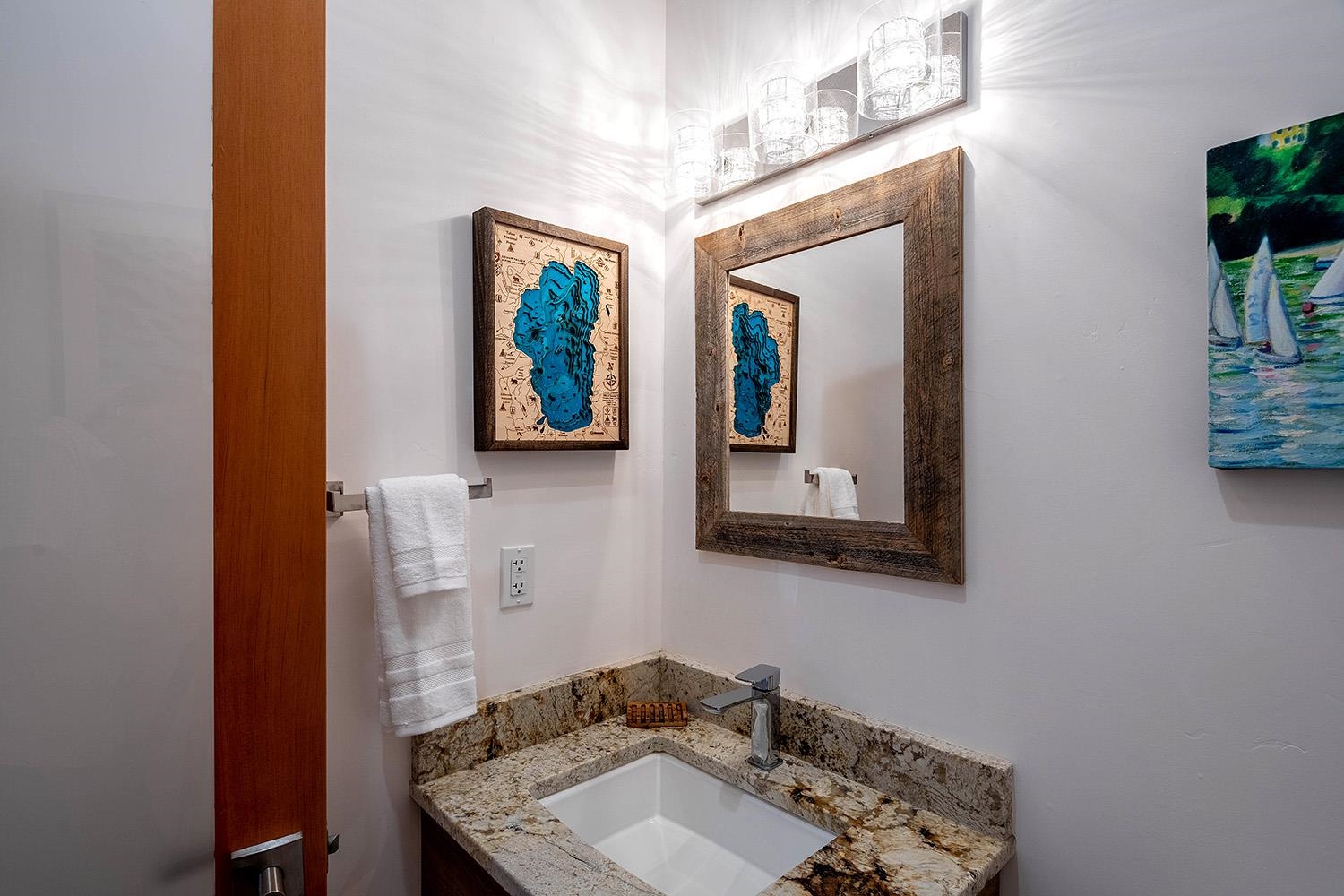 120 Smiley Circle Olympic Valley, CA 96146 - Photo 8 of 21 a bathroom with a granite countertop sink and a mirror