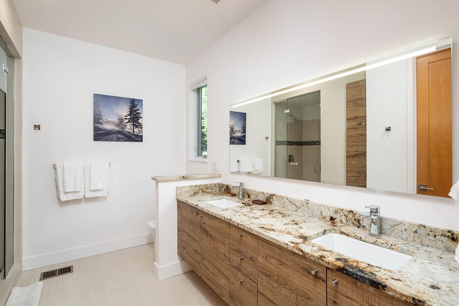 120 Smiley Circle Olympic Valley, CA 96146 - Photo 10 of 21 a bathroom with a granite countertop sink and a mirror