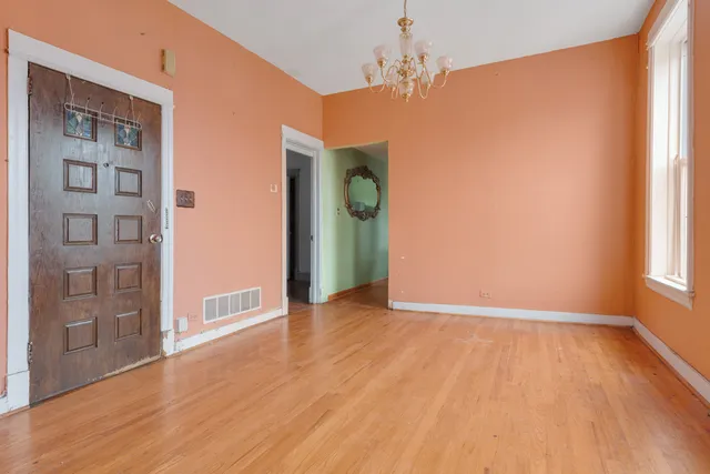 a view of livingroom with hardwood floor and window