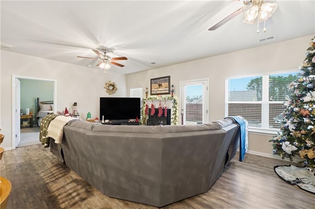 16 Brandon Lane Rome, GA 30165 - Photo 23 of 37 a living room with furniture and a flat screen tv