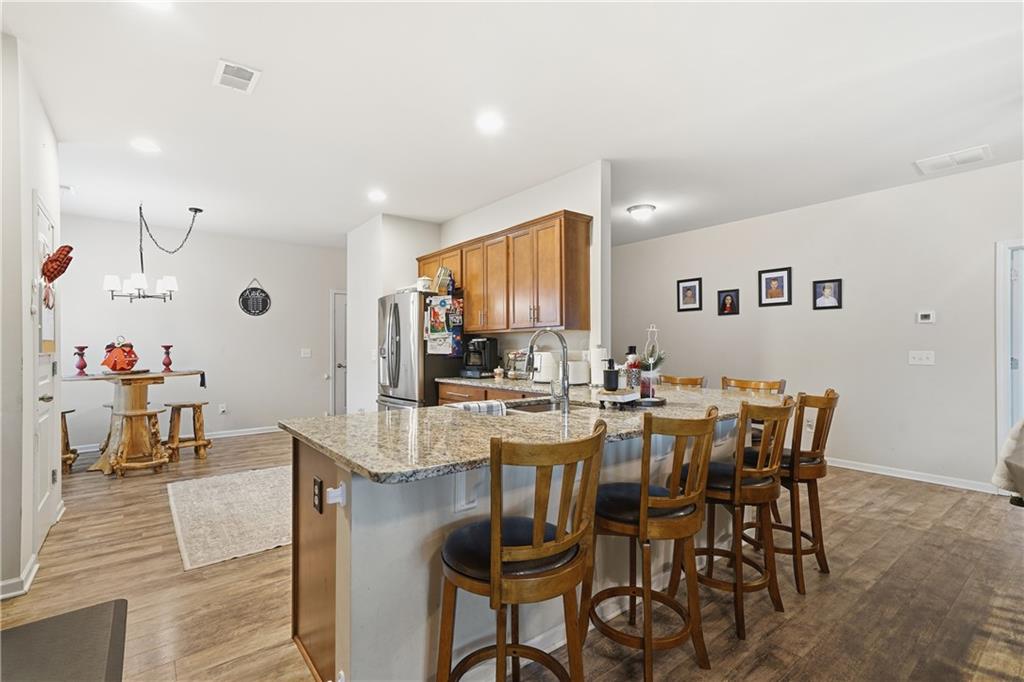 16 Brandon Lane Rome, GA 30165 - Photo 24 of 37 a view of a dining room with furniture and wooden floor