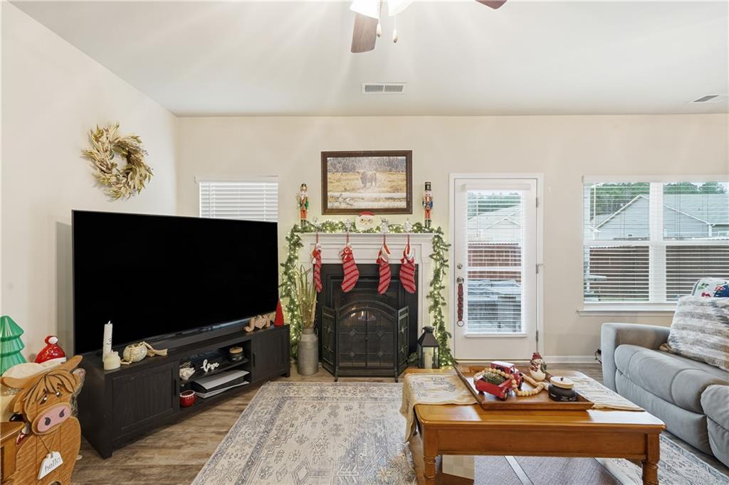 16 Brandon Lane Rome, GA 30165 - Photo 25 of 37 a living room with furniture and a flat screen tv