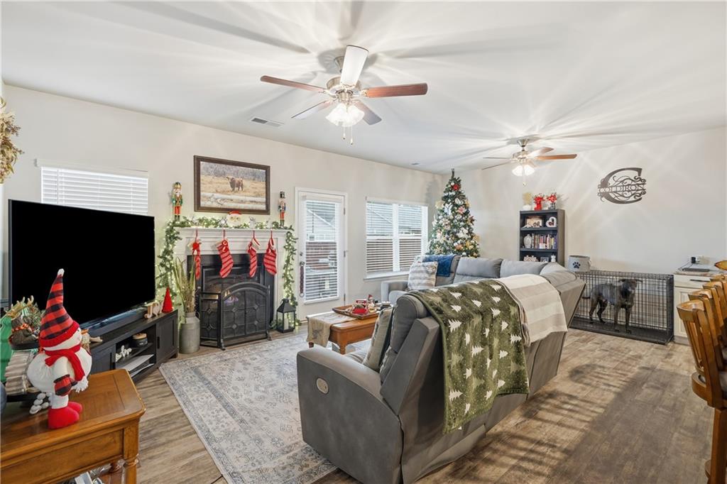 16 Brandon Lane Rome, GA 30165 - Photo 26 of 37 a living room with furniture a flat screen tv and a window