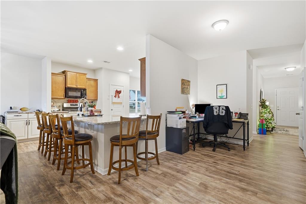 16 Brandon Lane Rome, GA 30165 - Photo 27 of 37 a view of a dining room with furniture and wooden floor