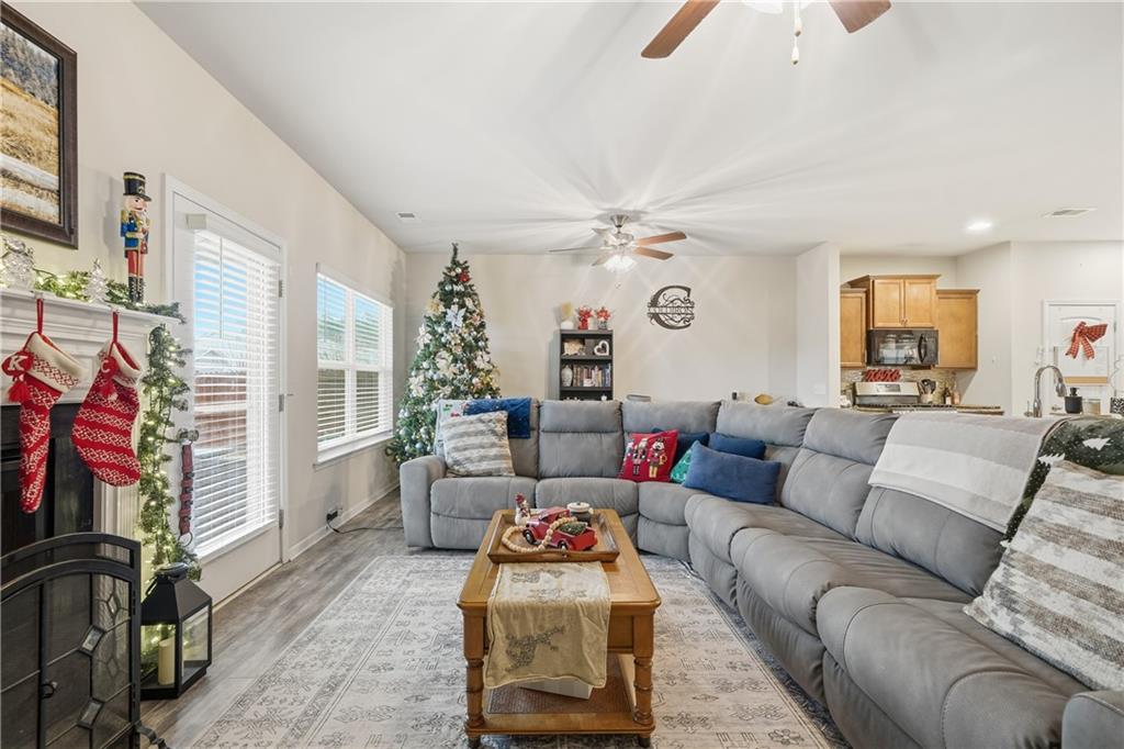 16 Brandon Lane Rome, GA 30165 - Photo 28 of 37 a living room with furniture and a flat screen tv