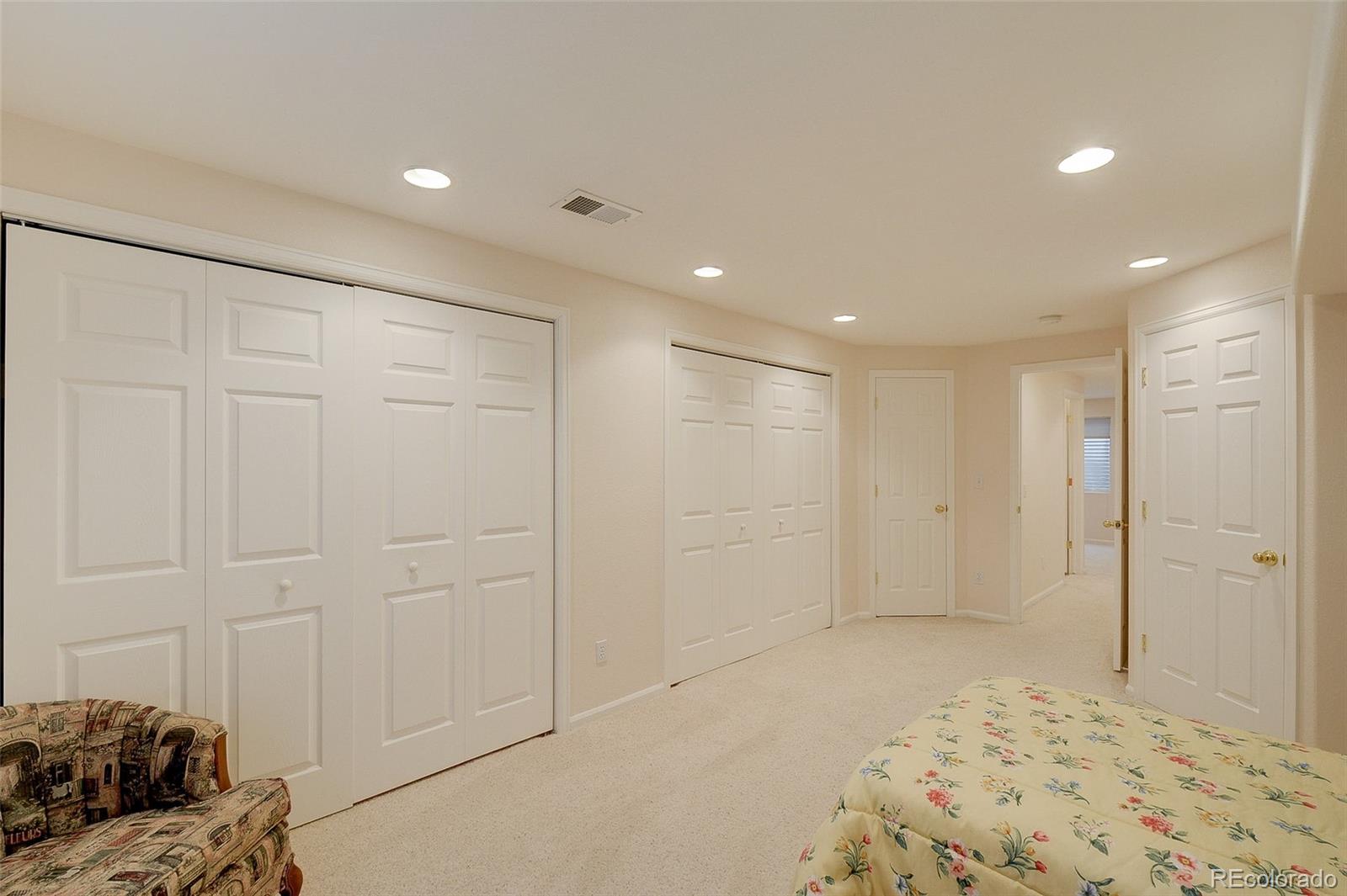 1237 Trail Ridge Road Longmont, CO 80504 - Photo 23 of 34 a bedroom with a bed and a window