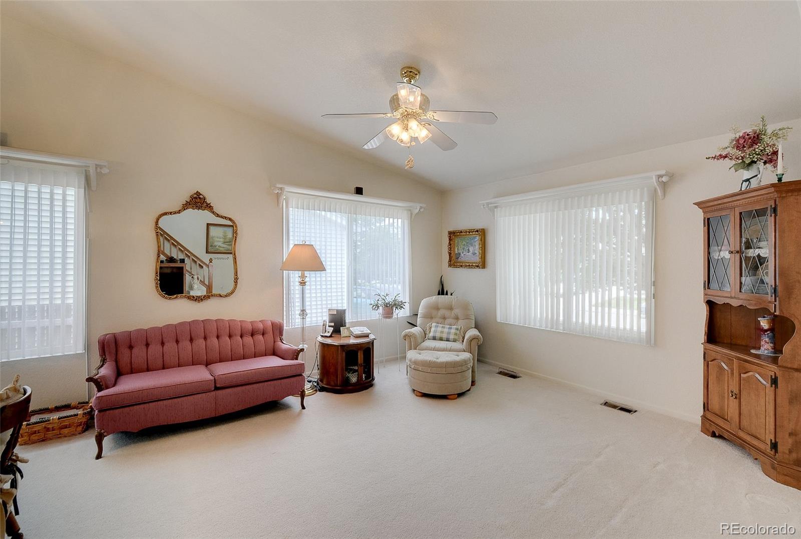 1237 Trail Ridge Road Longmont, CO 80504 - Photo 6 of 34 a living room with furniture and a large window