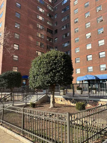 a view of balcony with wooden floor
