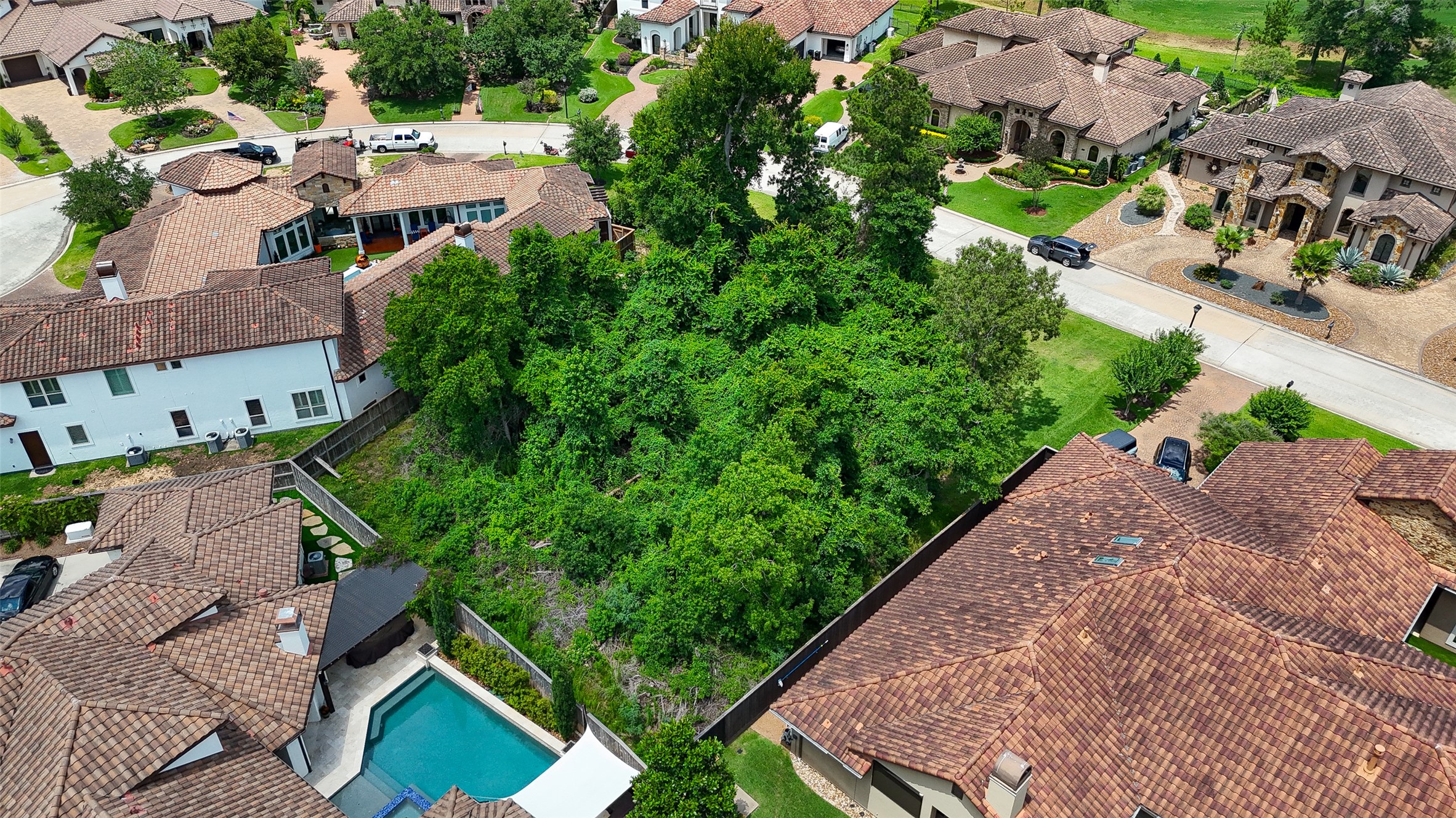 39 Post Shadow Estate Drive Spring, TX 77389 - Photo 7 of 19 an aerial view of multiple houses with yard