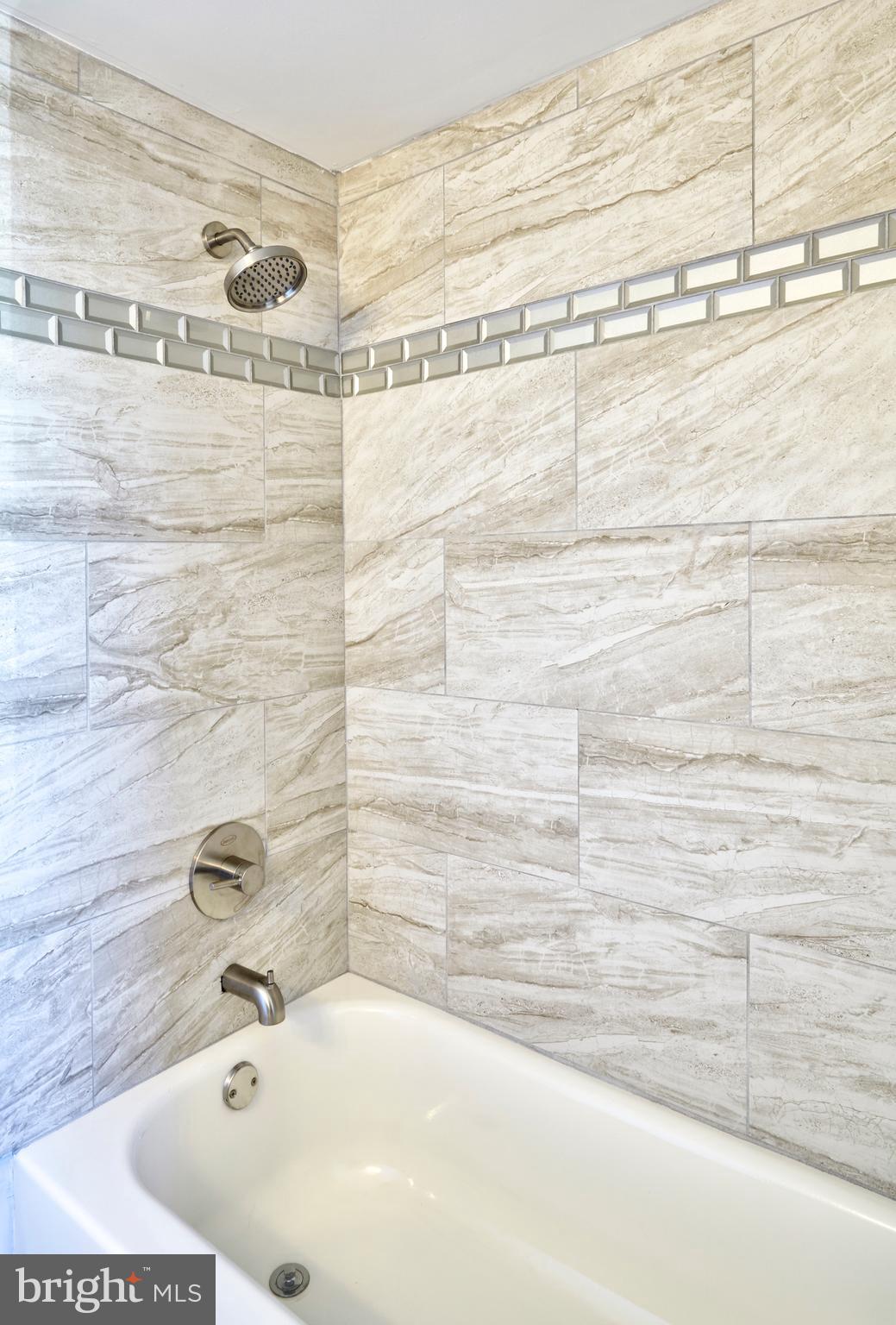 44 Cedarbrook Road Sicklerville, NJ 08081 - Photo 11 of 25 a bathroom with a bathtub and a shower