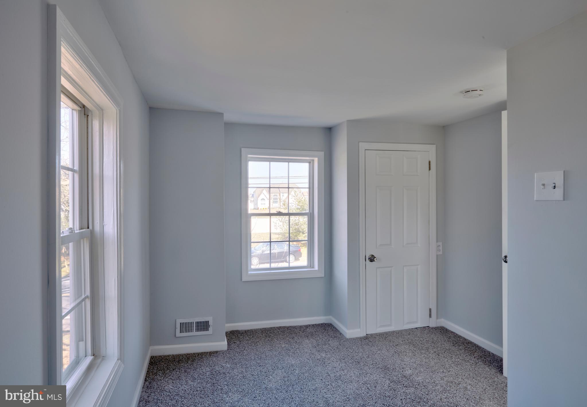 44 Cedarbrook Road Sicklerville, NJ 08081 - Photo 18 of 25 a view of an empty room with a window