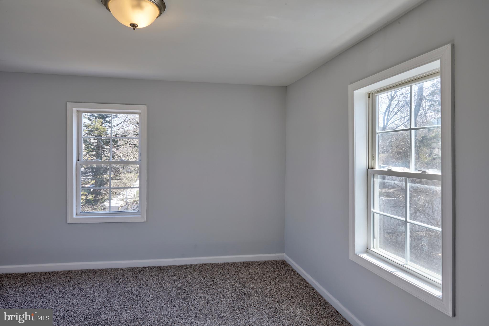 44 Cedarbrook Road Sicklerville, NJ 08081 - Photo 19 of 25 a view of an empty room with a window