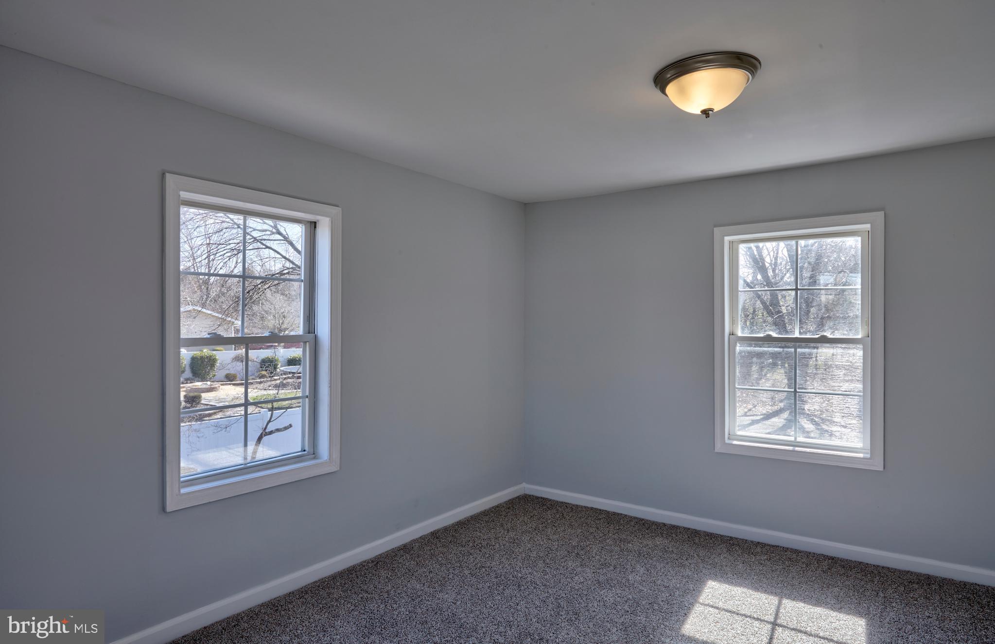 44 Cedarbrook Road Sicklerville, NJ 08081 - Photo 21 of 25 an empty room with windows
