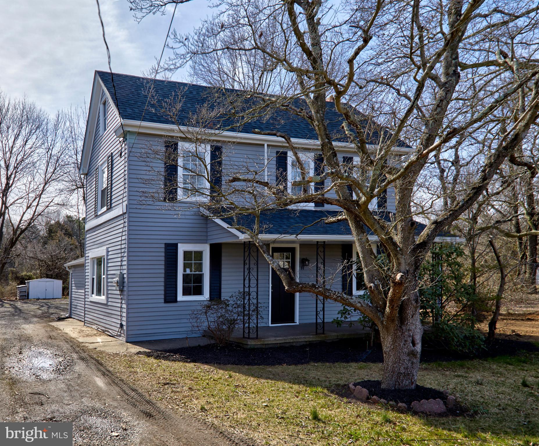 44 Cedarbrook Road Sicklerville, NJ 08081 - Photo 23 of 25 a front view of a house with a yard