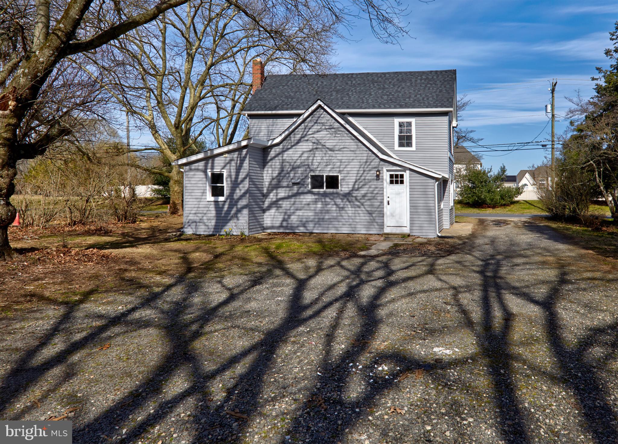 44 Cedarbrook Road Sicklerville, NJ 08081 - Photo 25 of 25 a house that has a tree in front of it