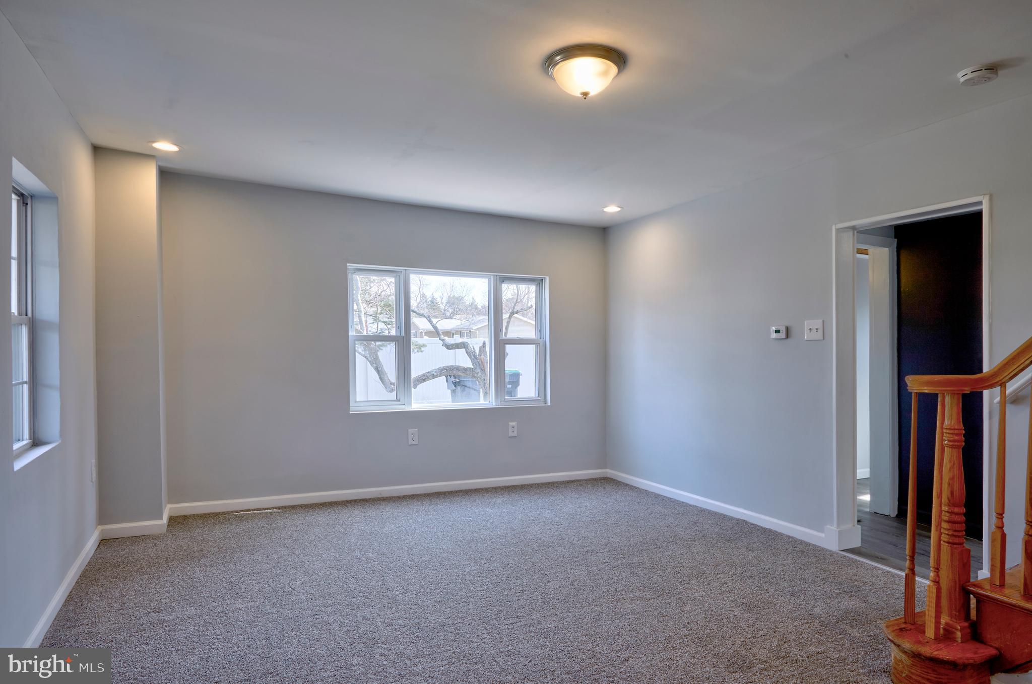 44 Cedarbrook Road Sicklerville, NJ 08081 - Photo 7 of 25 an empty room with windows and closet
