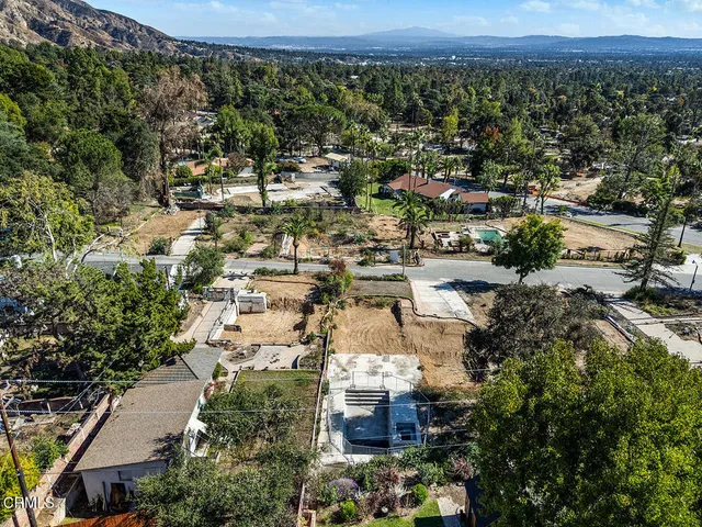 an aerial view of multiple house