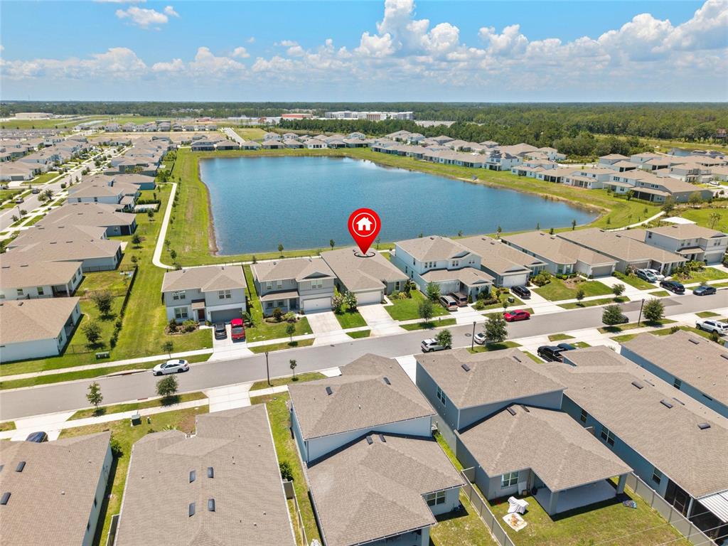 1634 Groveline Road St. Cloud, FL 34771 - Photo 40 of 43 an aerial view of a houses with outdoor space