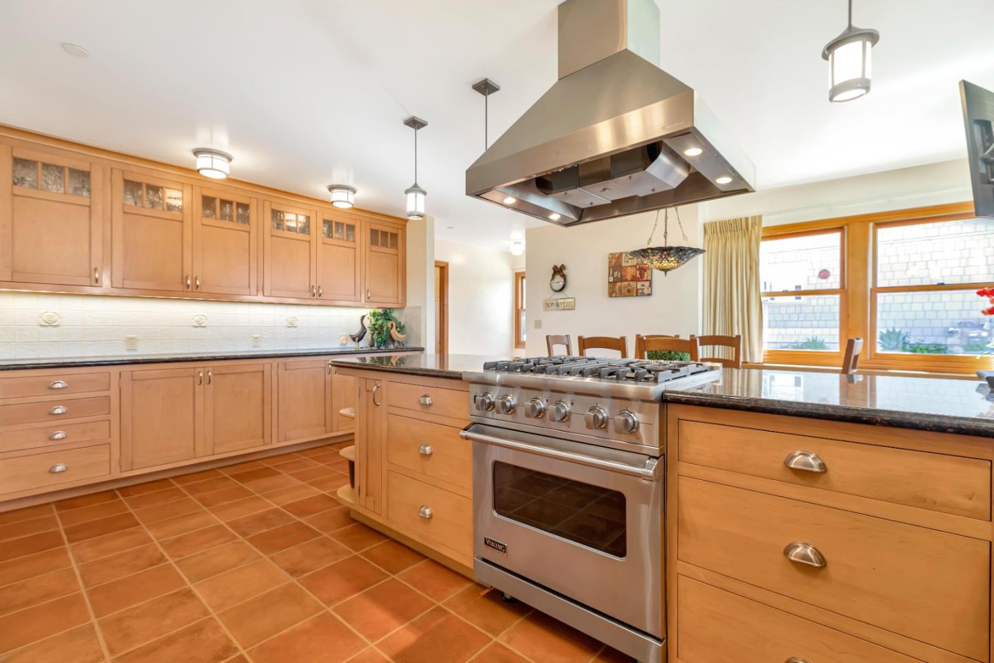 22820 San Juan Road Cupertino, CA 95014 - Photo 20 of 100 a kitchen with a stove cabinets and window
