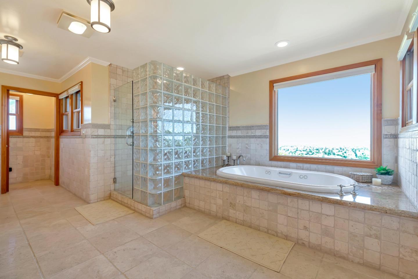22820 San Juan Road Cupertino, CA 95014 - Photo 27 of 100 a spacious bathroom with a tub and shower