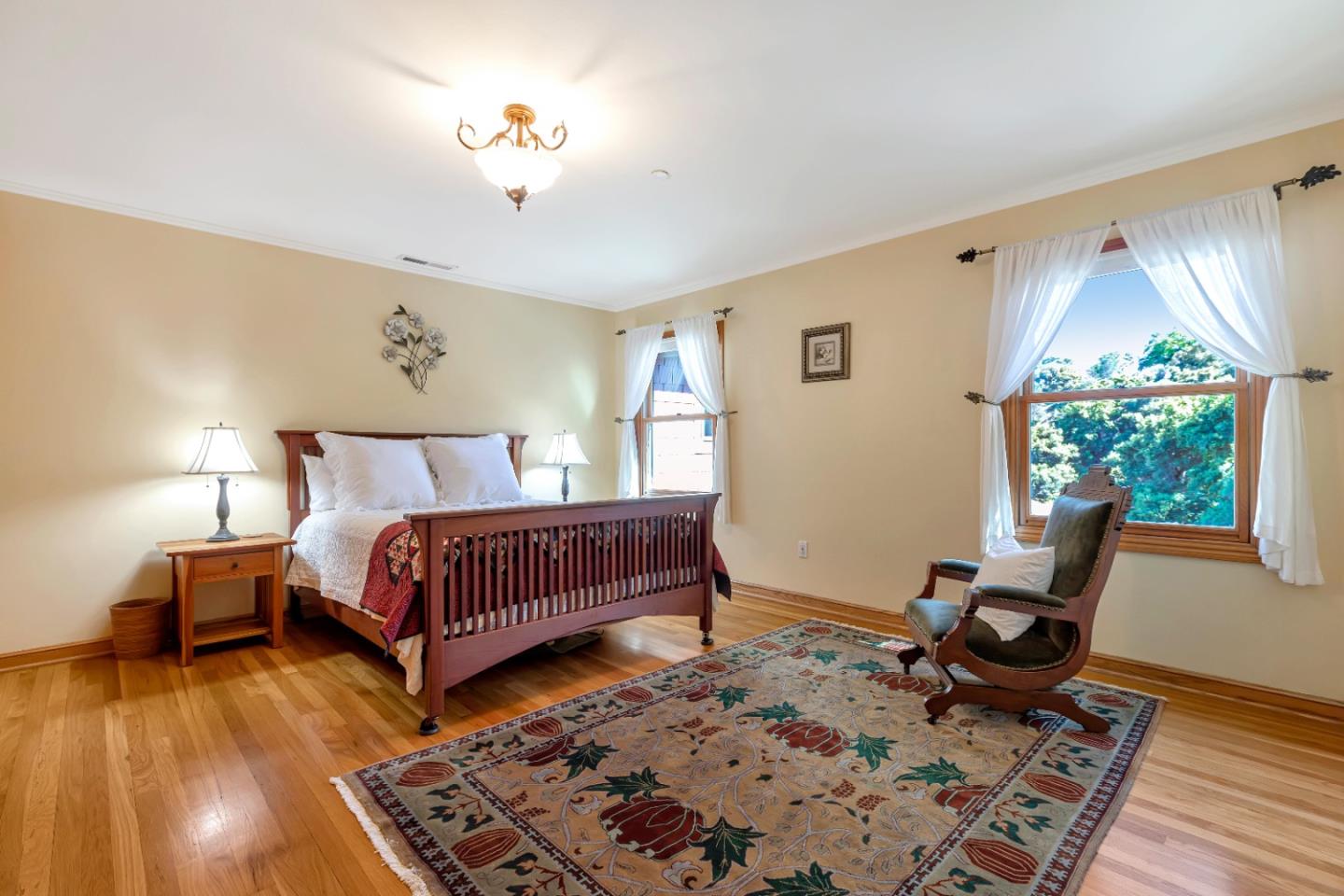 22820 San Juan Road Cupertino, CA 95014 - Photo 36 of 100 a bedroom with a bed and wooden floor