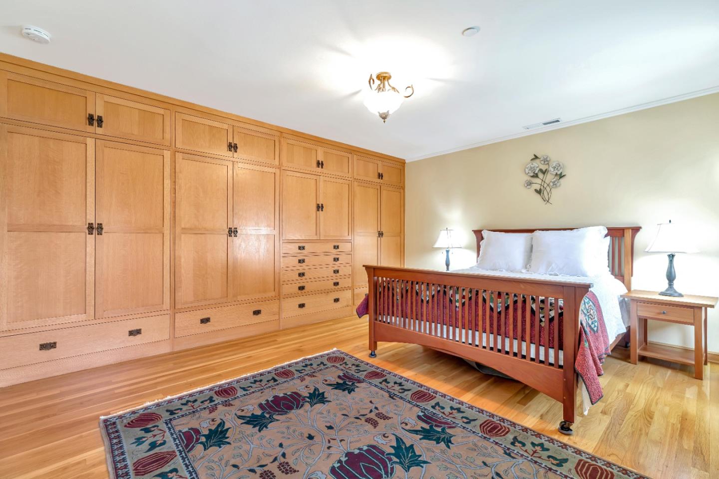 22820 San Juan Road Cupertino, CA 95014 - Photo 37 of 100 a bed room with a bed and a couch