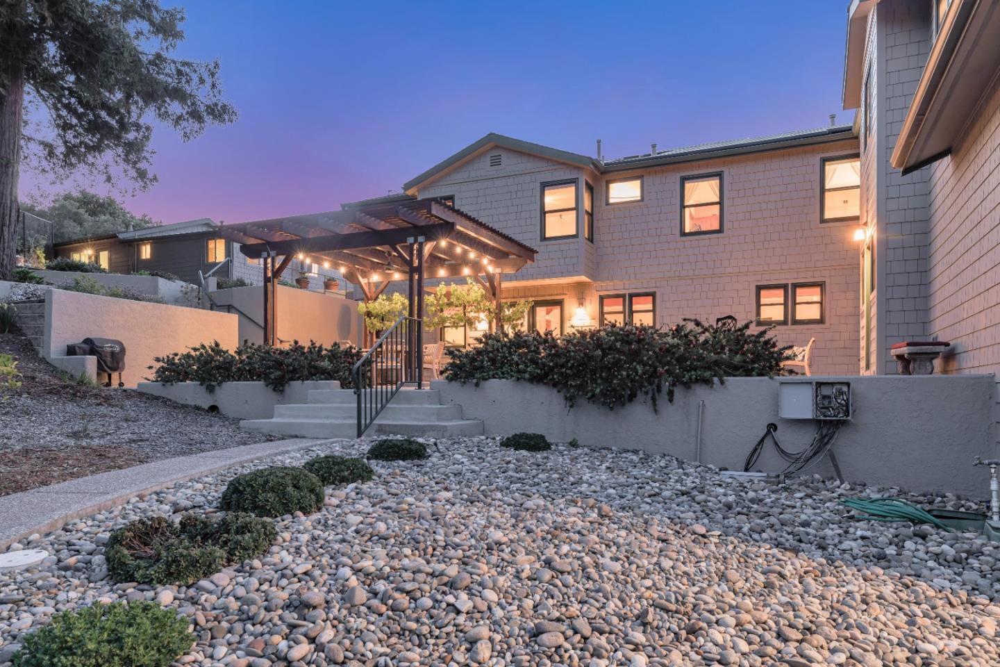 22820 San Juan Road Cupertino, CA 95014 - Photo 4 of 100 a view of a house with a yard and a tree