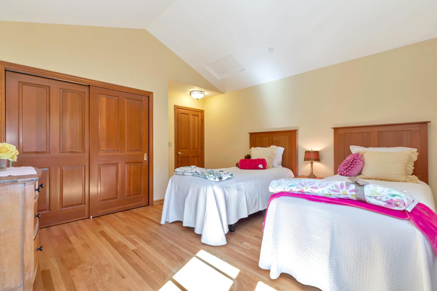 22820 San Juan Road Cupertino, CA 95014 - Photo 42 of 100 a bedroom with two beds and painted walls