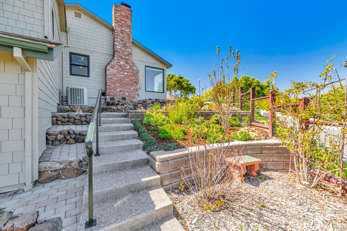 22820 San Juan Road Cupertino, CA 95014 - Photo 54 of 100 a front view of a house with a yard