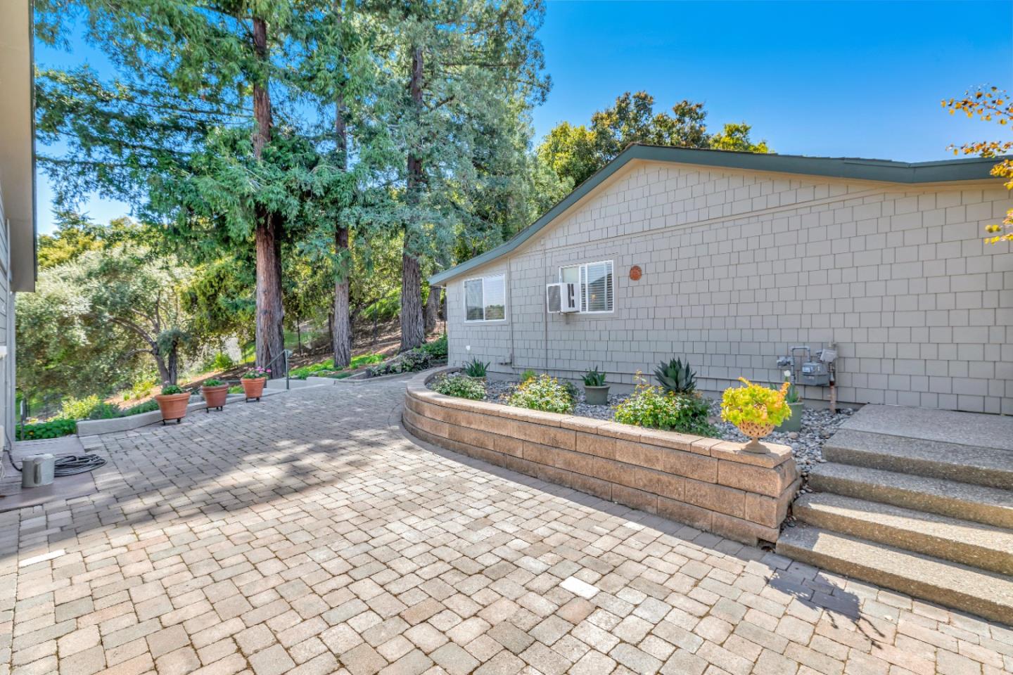 22820 San Juan Road Cupertino, CA 95014 - Photo 61 of 100 a front view of a house with patio