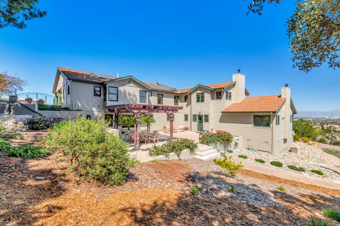 22820 San Juan Road Cupertino, CA 95014 - Photo 63 of 100 a front view of a house with a yard
