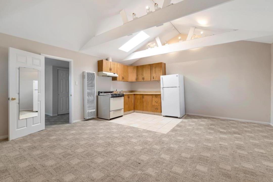 22820 San Juan Road Cupertino, CA 95014 - Photo 76 of 100 a view of a kitchen with a sink and a refrigerator