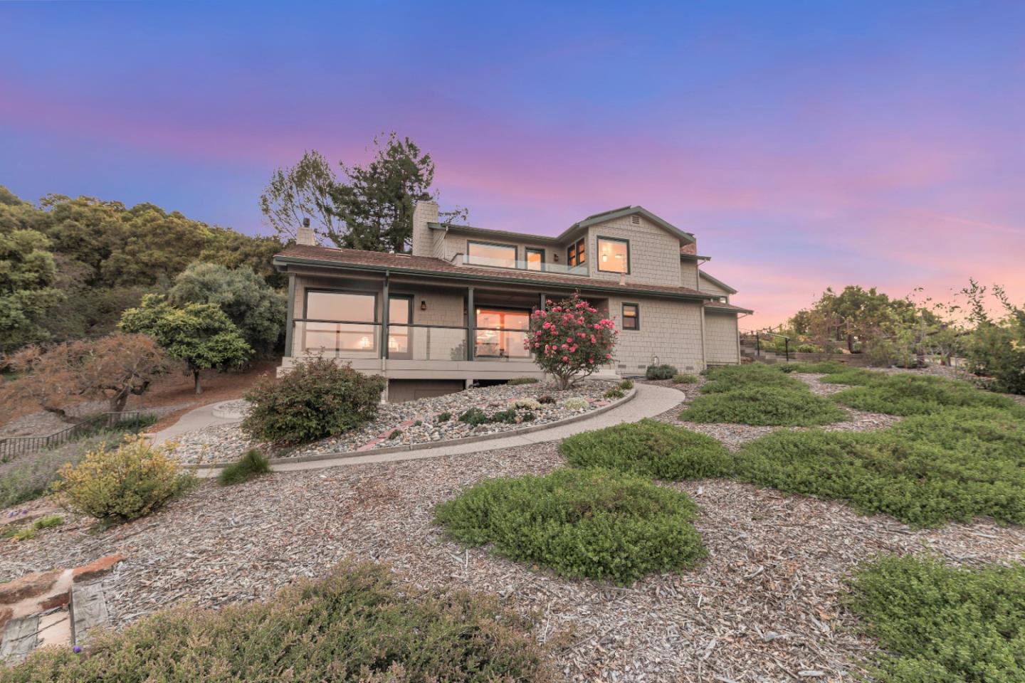 22820 San Juan Road Cupertino, CA 95014 - Photo 94 of 100 a front view of a house with garden