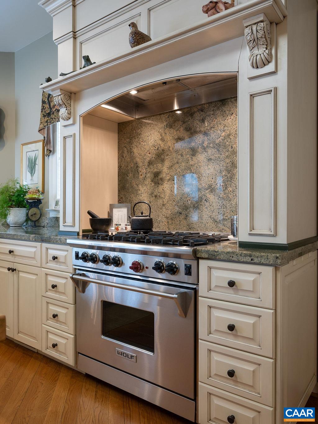 4051 Ballards Mill Road Free Union, VA 22940 - Photo 13 of 49 a stove top oven sitting inside of a kitchen