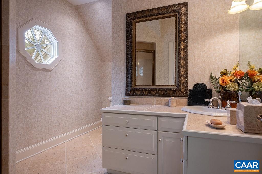 4051 Ballards Mill Road Free Union, VA 22940 - Photo 29 of 49 a bathroom with a sink a vanity and a mirror