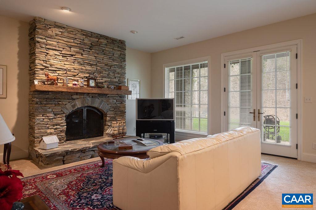4051 Ballards Mill Road Free Union, VA 22940 - Photo 31 of 49 a living room with furniture and a fireplace