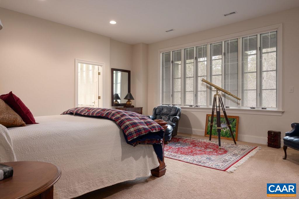 4051 Ballards Mill Road Free Union, VA 22940 - Photo 33 of 49 a bedroom with a bed and wooden floor