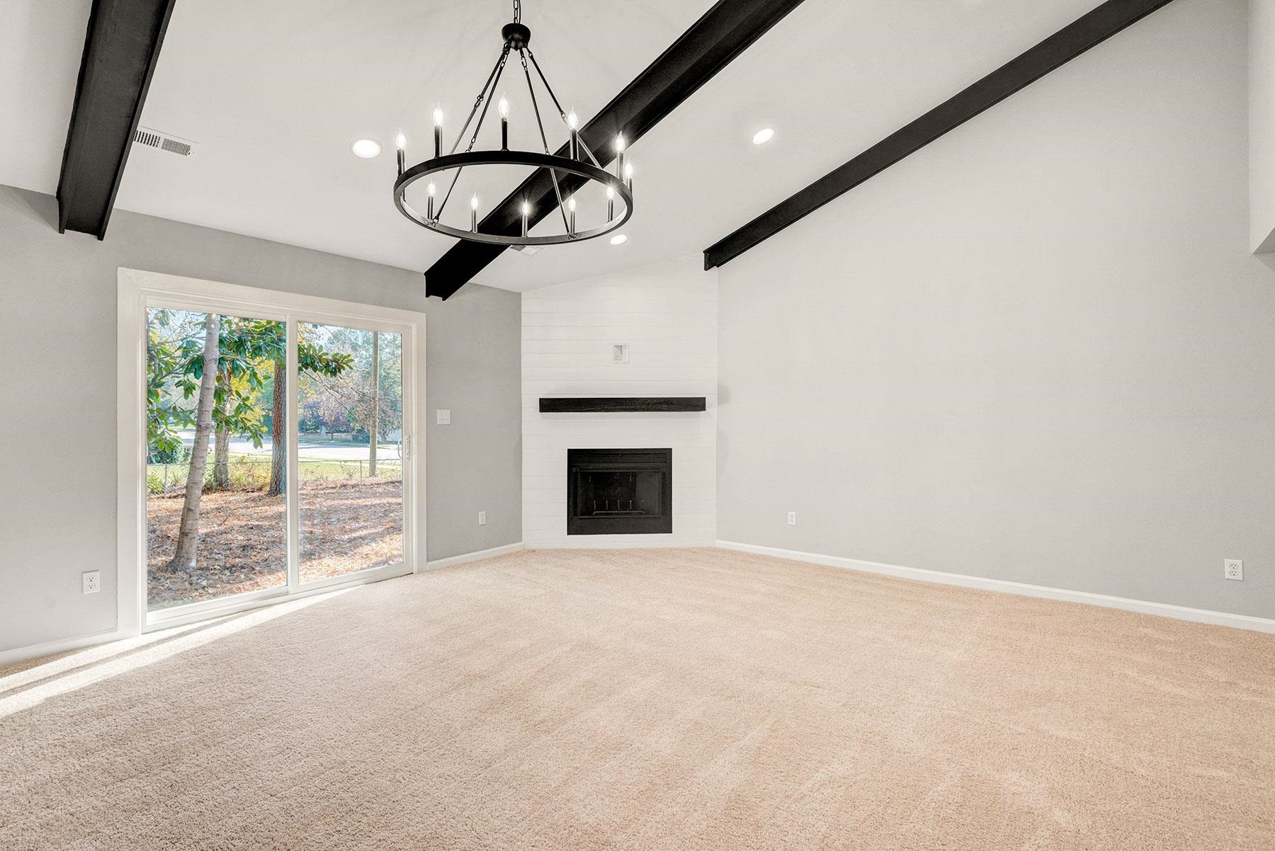 6500 Hammersmith Drive Raleigh, NC 27613 - Photo 11 of 21 a view of an empty room with windows