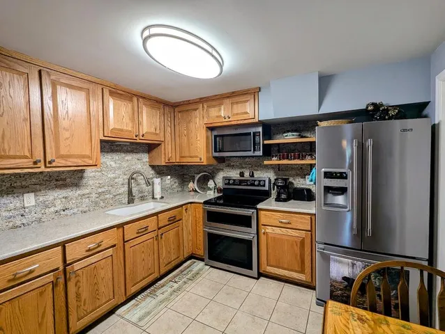 a room with furniture and air hockey table