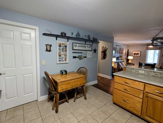 a room with storage and a book shelf